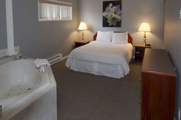 Imagen de la habitación del Motel Tiki Shores Inn & Suites. Foto 16
