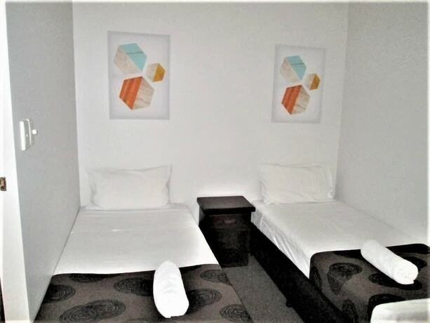 Imagen de la habitación del Motel Tower Court. Foto 22