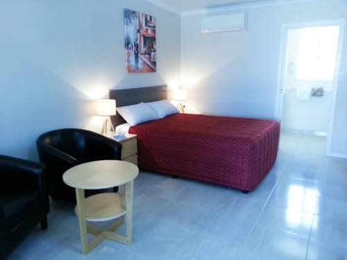 Imagen de la habitación del Motel Tropic Coast. Foto 1