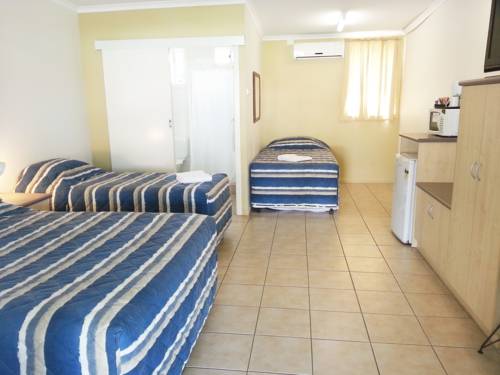 Imagen de la habitación del Motel Tropic Coast. Foto 2
