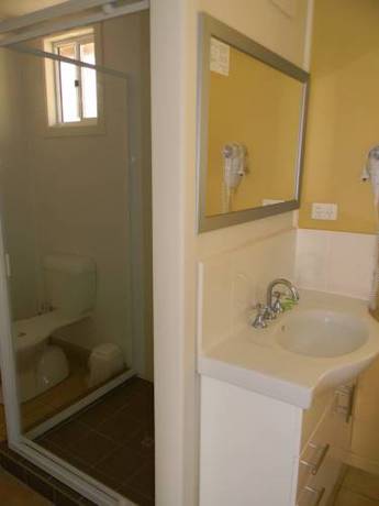 Imagen de la habitación del Motel Tropic Coast. Foto 5