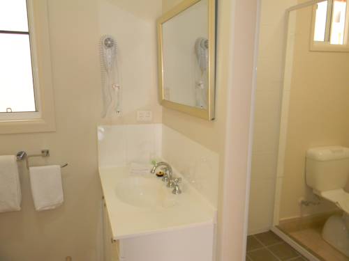 Imagen de la habitación del Motel Tropic Coast. Foto 6
