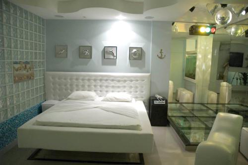 Imagen de la habitación del Motel Veneza (adults Only). Foto 9