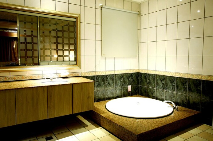 Imagen de la habitación del Motel Wen Mei. Foto 30