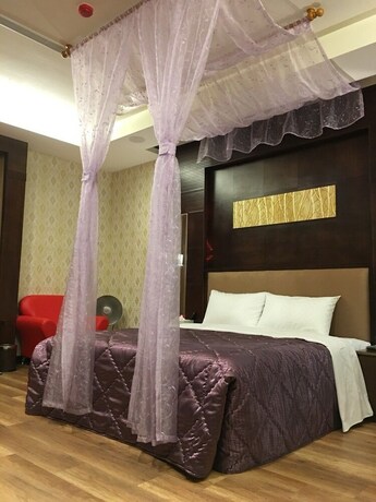 Imagen de la habitación del Motel Wen Mei. Foto 32