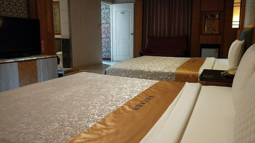 Imagen de la habitación del Motel Wen Mei. Foto 35