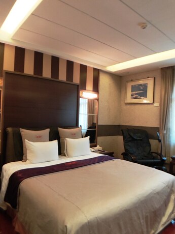 Imagen de la habitación del Motel Wunsin. Foto 23