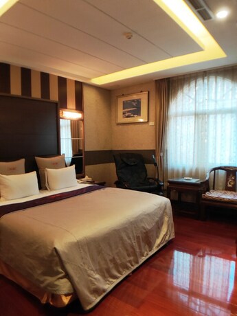 Imagen de la habitación del Motel Wunsin. Foto 25