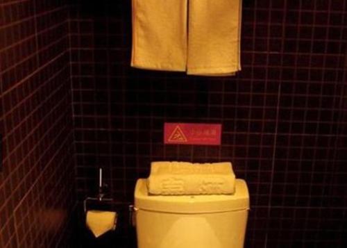 Imagen de la habitación del Motel Yi'ning Beihuan Road Shanghaicheng. Foto 5