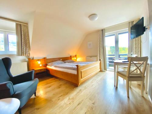 Imagen de la habitación del Pensión Am Weinberg. Foto 2