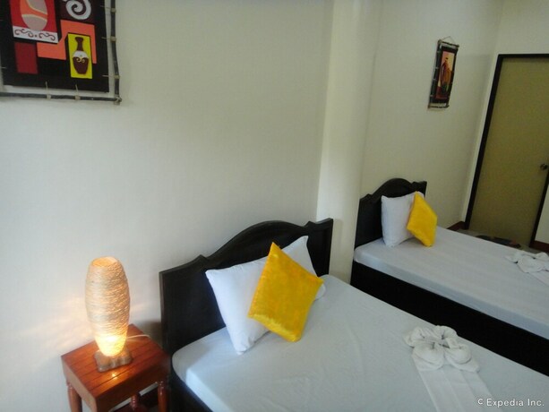 Imagen de la habitación del Pensión Amerson Place. Foto 18
