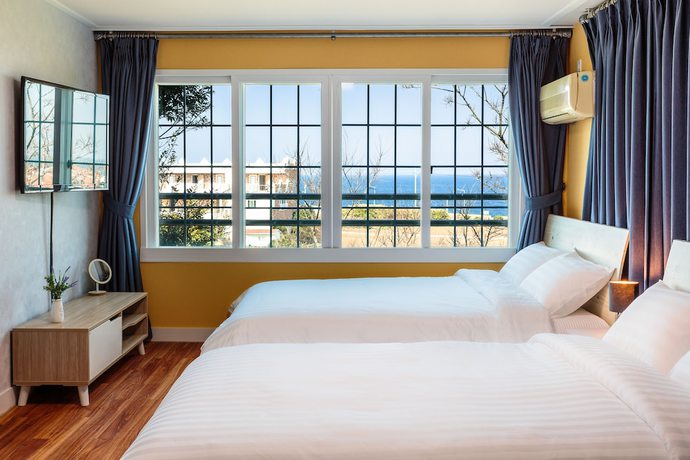 Imagen de la habitación del Pensión Beachscape Pension. Foto 11