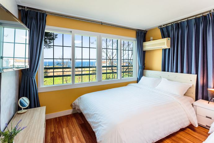 Imagen de la habitación del Pensión Beachscape Pension. Foto 19