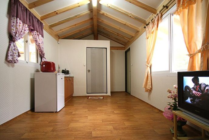 Imagen de la habitación del Pensión Bluewind. Foto 19