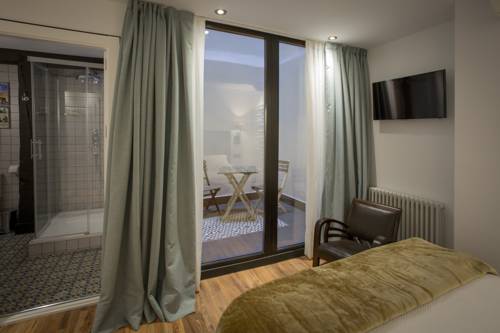 Imagen de la habitación del Pensión Boutique Caravan Cinema. Foto 3