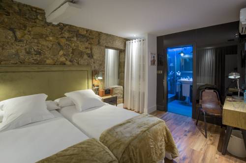 Imagen de la habitación del Pensión Boutique Caravan Cinema. Foto 10