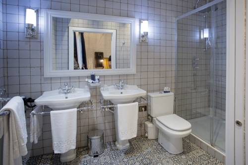 Imagen de la habitación del Pensión Boutique Caravan Cinema. Foto 11