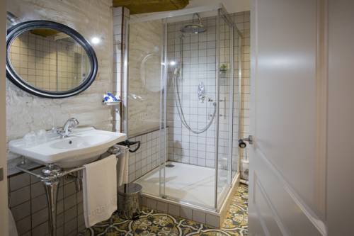 Imagen de la habitación del Pensión Boutique Caravan Cinema. Foto 13