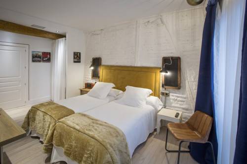 Imagen de la habitación del Pensión Boutique Caravan Cinema. Foto 14