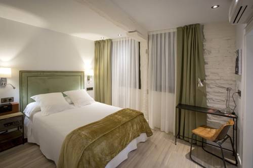 Imagen de la habitación del Pensión Boutique Caravan Cinema. Foto 15