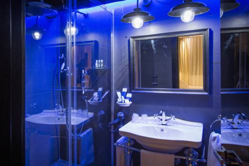 Imagen de la habitación del Pensión Boutique Caravan Cinema. Foto 16