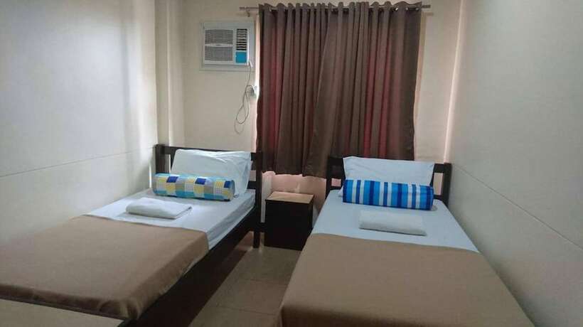 Imagen de la habitación del Pensión Calamba Plaza. Foto 11
