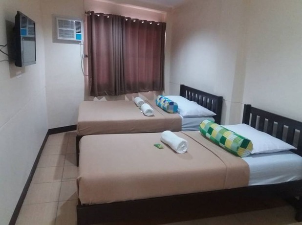 Imagen de la habitación del Pensión Calamba Plaza. Foto 12