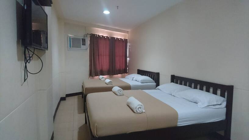 Imagen de la habitación del Pensión Calamba Plaza. Foto 16