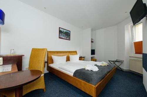 Imagen de la habitación del Pensión City Hotel Brandenburg. Foto 6