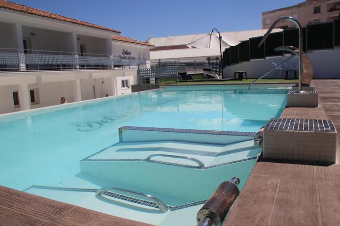 Imagen de la piscina del Pensión Deluxe Hostels And Suites Merida. Foto 11