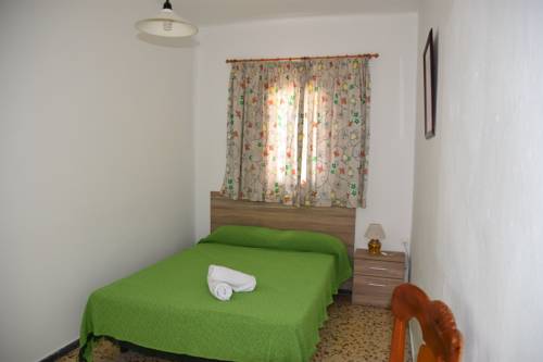 Imagen de la habitación del Pensión Eva, Playa de Mog&aacute;n. Foto 11