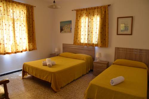 Imagen de la habitación del Pensión Eva, Playa de Mog&aacute;n. Foto 12