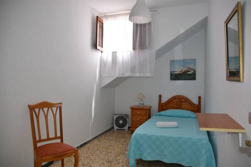 Imagen de la habitación del Pensión Eva, Playa de Mog&aacute;n. Foto 13