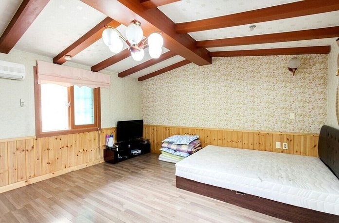 Imagen de la habitación del Pensión Evergreen Taean. Foto 17