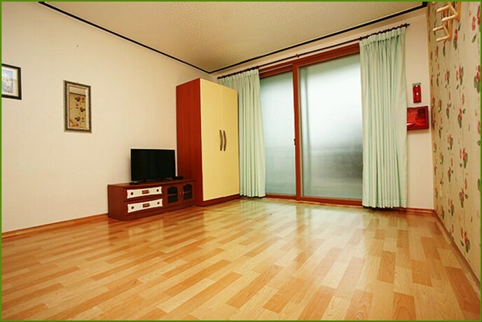 Imagen de la habitación del Pensión First, Taean. Foto 16