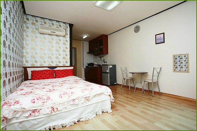 Imagen de la habitación del Pensión First, Taean. Foto 19