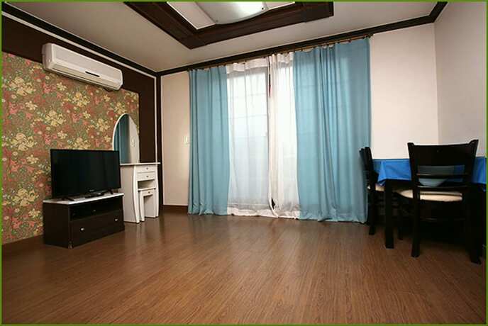 Imagen de la habitación del Pensión First, Taean. Foto 21