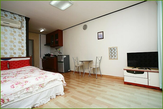 Imagen de la habitación del Pensión First, Taean. Foto 23