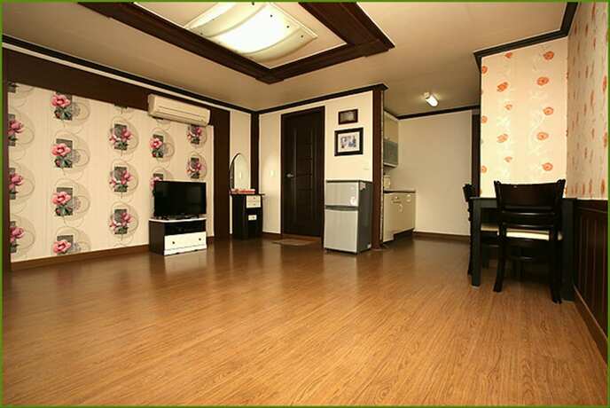 Imagen de la habitación del Pensión First, Taean. Foto 24