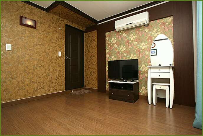 Imagen de la habitación del Pensión First, Taean. Foto 25