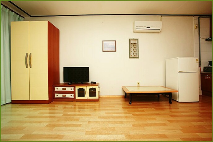 Imagen de la habitación del Pensión First, Taean. Foto 26