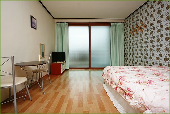 Imagen de la habitación del Pensión First, Taean. Foto 28