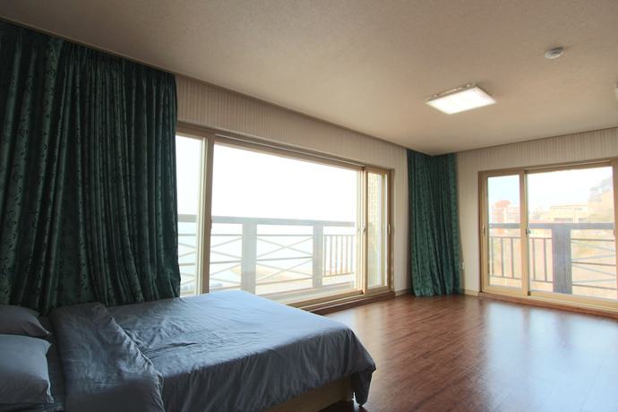 Imagen de la habitación del Pensión Ganghwado Four Season. Foto 8
