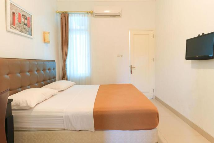 Imagen de la habitación del Pensión Ge JacMart Homestay Makassar. Foto 2