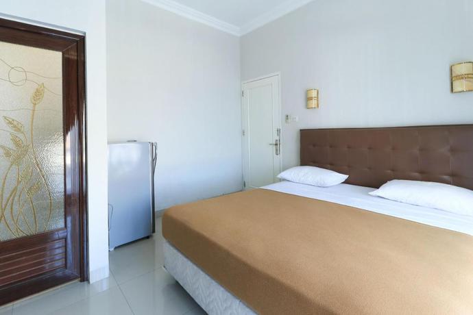 Imagen de la habitación del Pensión Ge JacMart Homestay Makassar. Foto 3