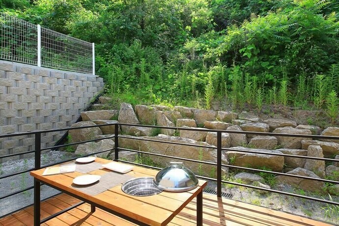 Imagen de la habitación del Pensión Hongcheon Stone Cube Spa. Foto 10