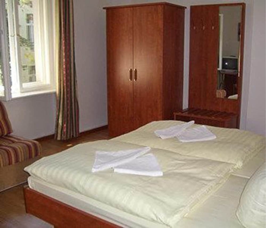 Imagen de la habitación del Pensión Hotel Kima. Foto 16