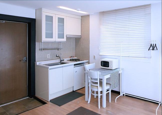 Imagen de la habitación del Pensión JM Village. Foto 7