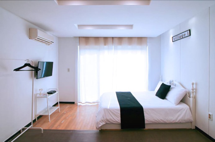 Imagen de la habitación del Pensión JM Village. Foto 8