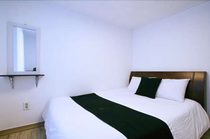 Imagen de la habitación del Pensión JM Village. Foto 9